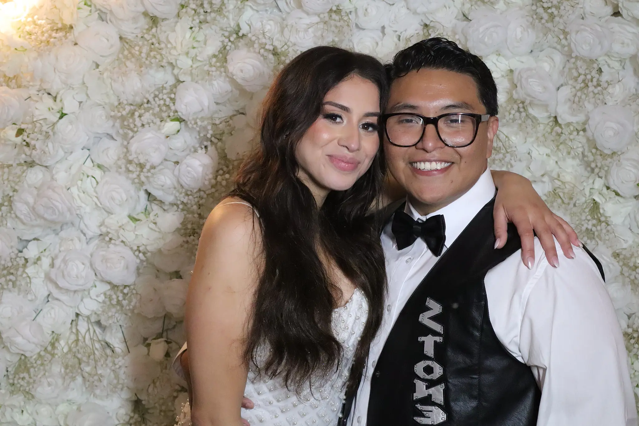 Bride and groom smiling together at the Caretto wedding