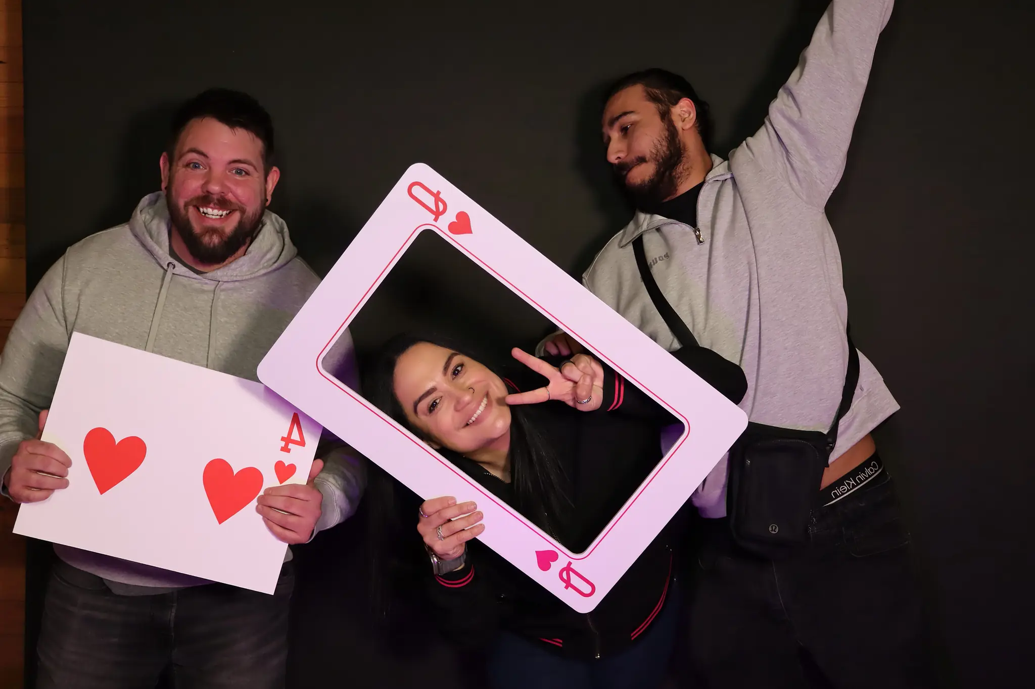 Playful group pose captured with professional DSLR lighting by Images & Creations