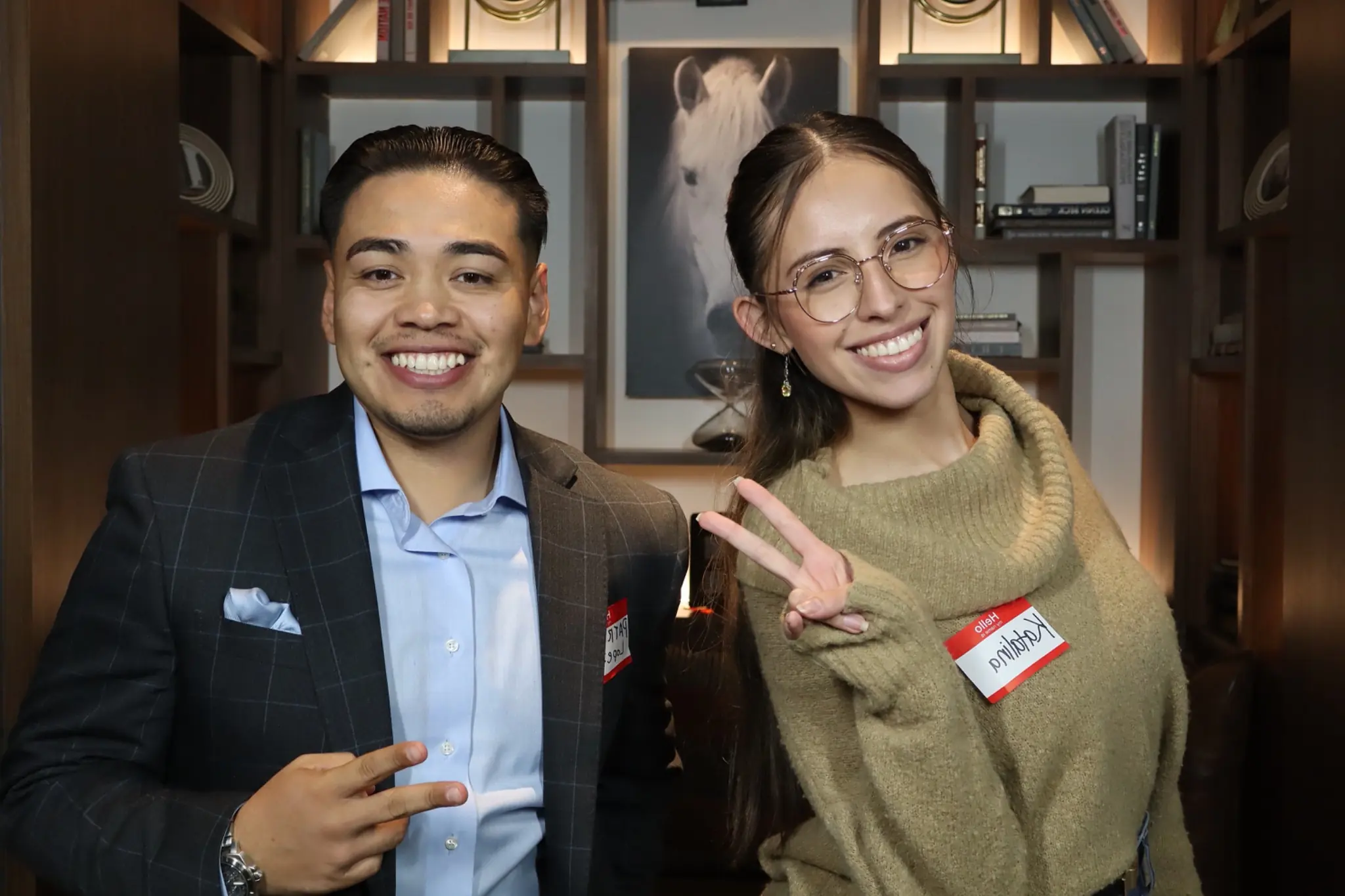 Guests posing together during a corporate networking mixer