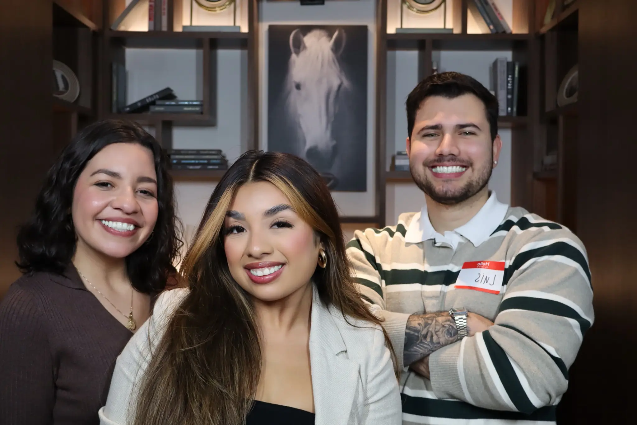 Three corporate guests photographed with polished DSLR lighting