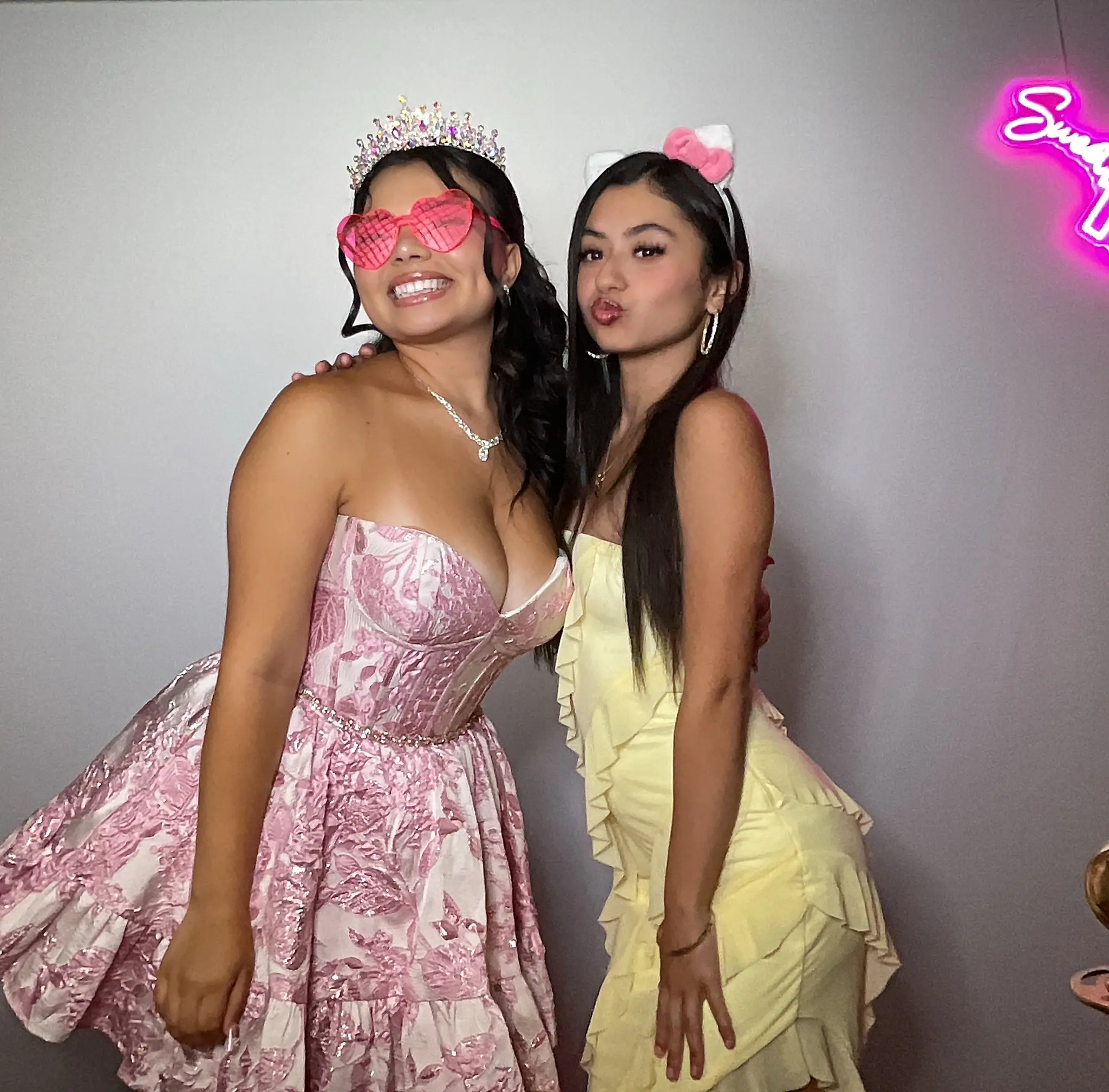Maleah and a friend posing together at her Sweet 16 by Images & Creations