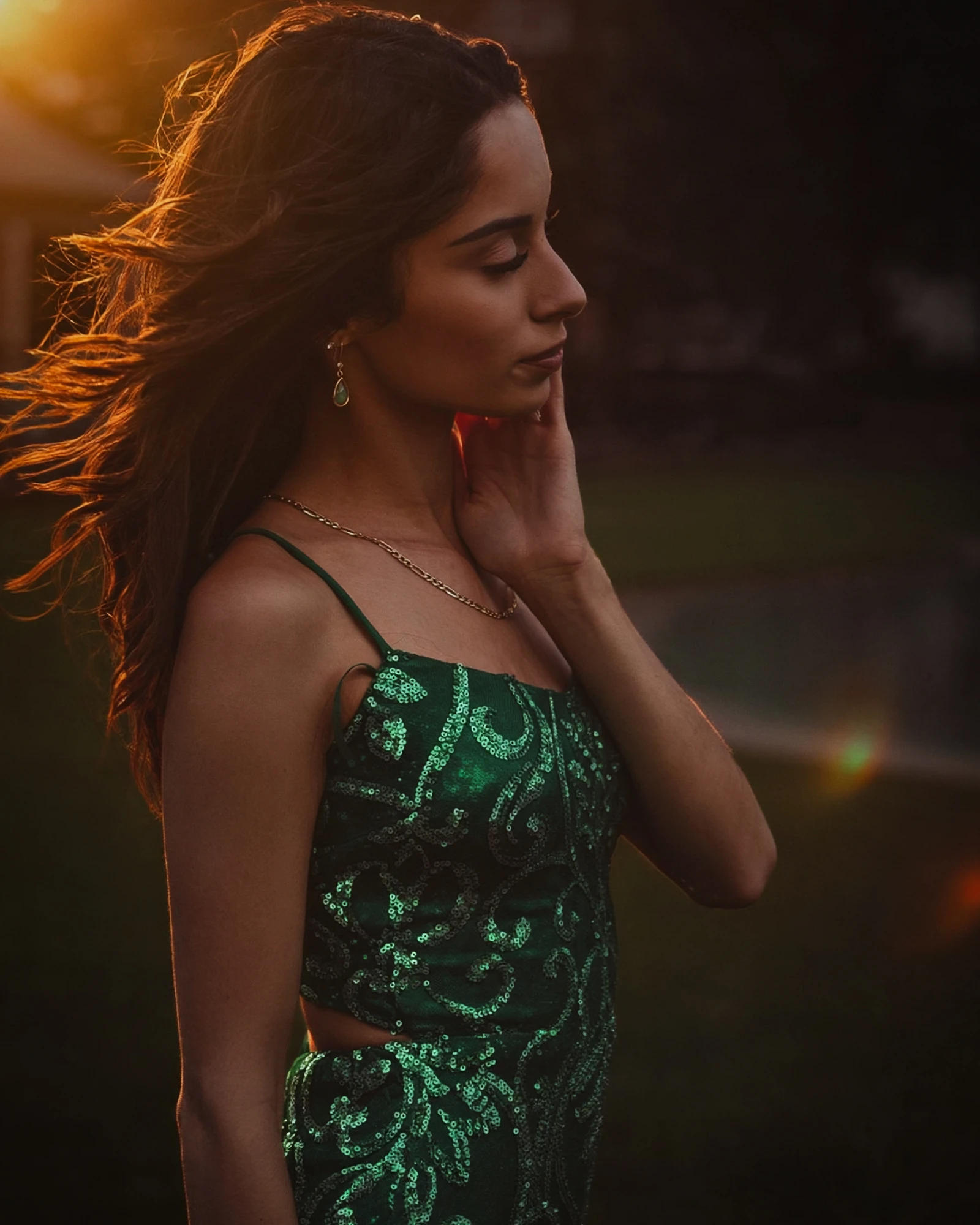 Prom portrait in a green dress photographed at sunset in Chicago